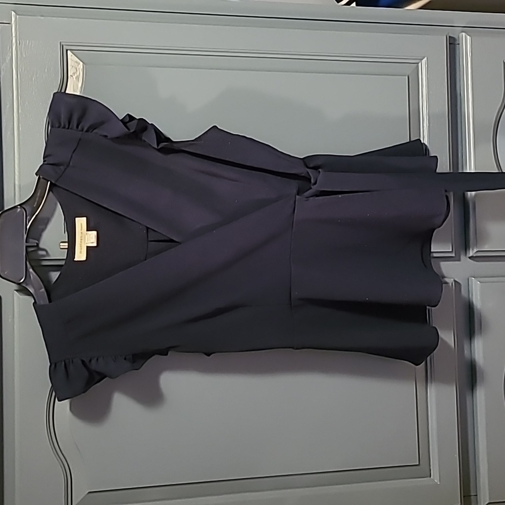 Very pretty navy top. Ruffle sleeves elastic waist. Pell bottom